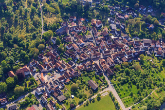 View of the village below the castle of the same name from the west in the district Gamburg in Werbach in the state Baden-Wuerttemberg, Germany