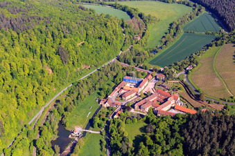 Aerial photograpy of Hotel Kloster Bronnbach with Abbey Garden, Abbey Church of the Assumption of Mary and Missionaries of the Holy Family Monastery Bronnbach from the south in the district Bronnbach in Wertheim in the state Baden-Wuerttemberg, Germany