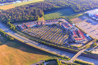 Oblique view of Outlet Wertheim Village with adidas Outlet Store Wertheim, Nike Factory Store and AIGNER Outlet Wertheim in the district Bettingen in Wertheim in the state Baden-Wuerttemberg, Germany