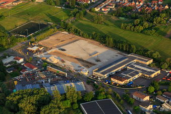 Aerial view of Construction site with foundation of the new logistics park of HANSAINVEST and DFI-Real-Estate Kandel after demolition of the OBI market in the district Minderslachen in Kandel in the state Rhineland-Palatinate, Germany
