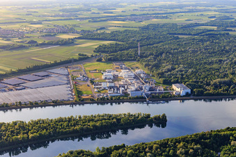 Industrial and Port Zone with industrial facilities on the Rhine from the southeast of Jungbunzlauer SA and TEREOS Starch & Sweeteners Europe in front of the CEVA Logistics car warehouse in Marckolsheim in the state Bas-Rhin, France
