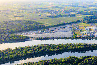 Aerial view of Industrial and Port Zone with industrial facilities on the Rhine from the southeast of Jungbunzlauer SA and TEREOS Starch & Sweeteners Europe in front of the CEVA Logistics car warehouse in Marckolsheim in the state Bas-Rhin, France