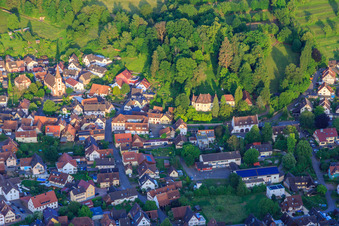 View of the wine-growing village with the castle and castle park from the west in the district Heimbach in Teningen in the state Baden-Wuerttemberg, Germany