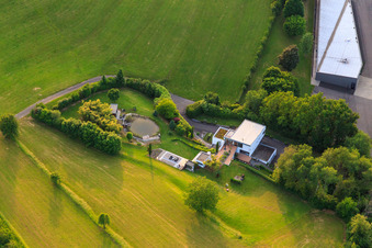 Villa with pond on Kippenheimer Straße in the district Schmieheim in Kippenheim in the state Baden-Wuerttemberg, Germany