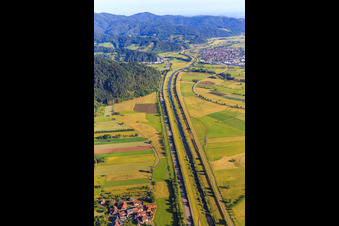 Straight course of the B33 parallel to the river Kinzig and the railway line to the northwest to Biberach in Steinach in the state Baden-Wuerttemberg, Germany
