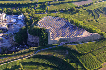 Photovoltaic open-space system on a spoil heap of the quarry Bötzingen of HANS G. HAURI KG Mineralstoffwerke in the district Oberschaffhausen in Bötzingen in the state Baden-Wuerttemberg, Germany