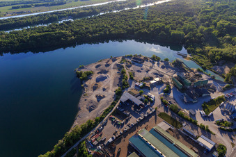 Aerial view of Gravel pit Breisach am Rhein with MSW Metallhandel Südwest GmbH and Adolf Braun KG gravel and ready-mixed concrete works in the district Gündlingen in Breisach am Rhein in the state Baden-Wuerttemberg, Germany