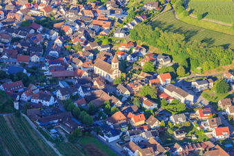 Wine-growing village in the Kaiserstuhl with St. George's Church from the west in the district Achkarren in Vogtsburg im Kaiserstuhl in the state Baden-Wuerttemberg, Germany