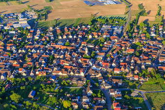 View of the town from the west with the Protestant church in Weisweil in the state Baden-Wuerttemberg, Germany