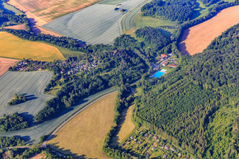 Village view with forest pool from the north in the district Alterode in Arnstein in the state Saxony-Anhalt, Germany