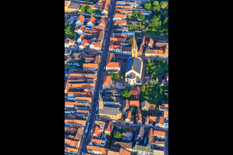 Aerial view of Catholic Church of St. Nicholas and Protestant Church Bellheim on Hauptstr in Bellheim in the state Rhineland-Palatinate, Germany