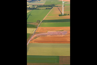 Aerial view of Repowering Wind Farm Minfeld. JUWI replaces four old turbines (GE 1.5) from 2004 with two new, modern Vestas V162 turbines, each with six megawatts. in Minfeld in the state Rhineland-Palatinate, Germany