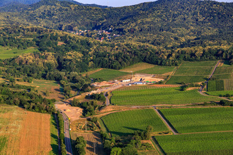Construction site of the eastern tunnel portal for the Astrid Tunnel for the underpass and bypass of Bad Bergzabern between B38 (Weinstraße) and B427 (Kurtalstraße) in Dörrenbach in the state Rhineland-Palatinate, Germany viewn from the air