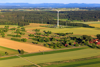Wind energy plant above open-space PV system behind the golf club Alpirsbach eV in the district Peterzell in Alpirsbach in the state Baden-Wuerttemberg, Germany