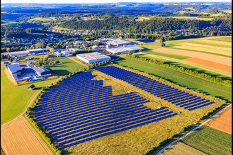 Aerial view of Open-space photovoltaic system in front of the Oberwiesachstraße industrial area in the district Betzweiler in Loßburg in the state Baden-Wuerttemberg, Germany