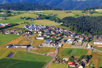 View of the town from the northeast with Hess Montagen & Bauelemente GmbH / Holzbau GmbH & Co.KG and Herzog Treppen und Holzbau GmbH in Aichhalden in the state Baden-Wuerttemberg, Germany
