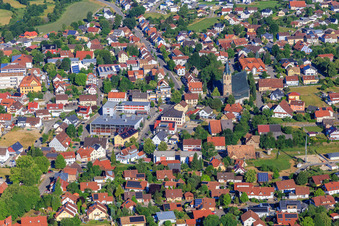 Town center with St. Martinus Church, Wehle sports hall and Volksbank Schwarzwald-Donau-Neckar eG in Dunningen in the state Baden-Wuerttemberg, Germany
