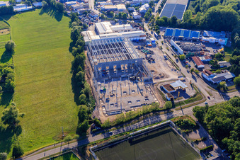 Construction site of the new logistics park of HANSAINVEST and DFI-Real-Estate Kandel after demolition of the OBI market in the district Minderslachen in Kandel in the state Rhineland-Palatinate, Germany from the plane