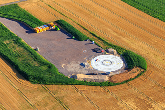 Oblique view of Repowering Wind Farm Minfeld. JUWI replaces four old turbines (GE 1.5) from 2004 with two new, modern Vestas V162 turbines, each with six megawatts. in Minfeld in the state Rhineland-Palatinate, Germany