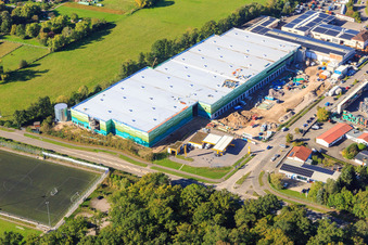 Construction site of the new logistics park of HANSAINVEST and DFI-Real-Estate Kandel after demolition of the OBI market in the district Minderslachen in Kandel in the state Rhineland-Palatinate, Germany from a drone