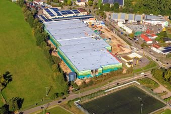 Construction site of the new logistics park of HANSAINVEST and DFI-Real-Estate Kandel after demolition of the OBI market in the district Minderslachen in Kandel in the state Rhineland-Palatinate, Germany seen from a drone