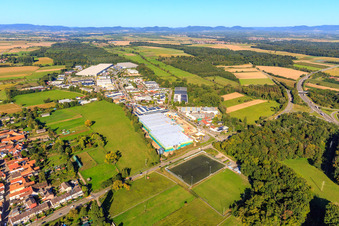 Aerial view of Construction site of the new logistics park of HANSAINVEST and DFI-Real-Estate Kandel after demolition of the OBI market in the district Minderslachen in Kandel in the state Rhineland-Palatinate, Germany