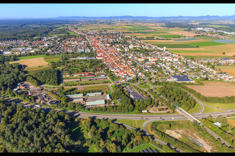City view with motorway exit Kandel South of the A65 from the east in Kandel in the state Rhineland-Palatinate, Germany