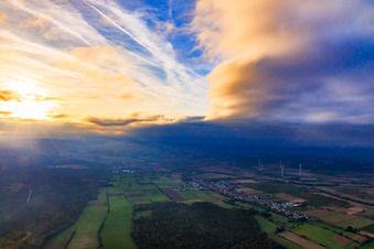 Clouds over the cattle track and Bienwald forest in the autumn evening light in Freckenfeld in the state Rhineland-Palatinate, Germany