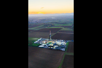 Aerial view of Vulcan Energy's V20 deep drilling site in the evening light at Schleidberg for the extraction of geothermal energy and lithium in Insheim in the state Rhineland-Palatinate, Germany