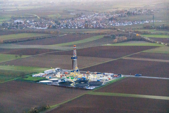 Oblique view of Vulcan Energy's V20 deep drilling site in the evening light at Schleidberg for the extraction of geothermal energy and lithium in Insheim in the state Rhineland-Palatinate, Germany