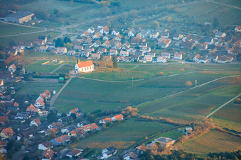 Aerial view of View of the town from the west with the Dionysius Chapel between clouds and mountains in the district Gleiszellen in Gleiszellen-Gleishorbach in the state Rhineland-Palatinate, Germany