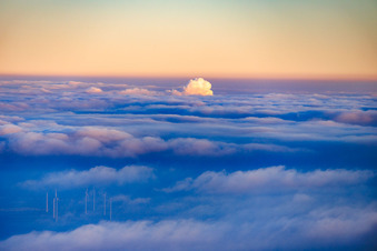 Exhaust fumes from the steam power plant Karlsruhe break through the clouds in the district Daxlanden in Karlsruhe in the state Baden-Wuerttemberg, Germany