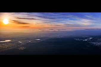 Aerial view of Sunset over winter fog at the Haardt Mountains in the district Speyerdorf in Neustadt an der Weinstraße in the state Rhineland-Palatinate, Germany