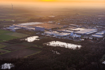 Interpark industrial park seen from the northeast on a foggy winter evening in Offenbach an der Queich in the state Rhineland-Palatinate, Germany