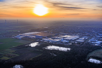 Aerial photograpy of Interpark industrial park seen from the northeast on a foggy winter evening in Offenbach an der Queich in the state Rhineland-Palatinate, Germany