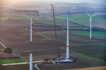 Aerial view of Giant crane for the repowering of the wind farm Minfeld. JUWI is replacing four old turbines (GE 1.5) from 2004 with two new, modern Vestas V162 turbines, each with six MW. in Minfeld in the state Rhineland-Palatinate, Germany