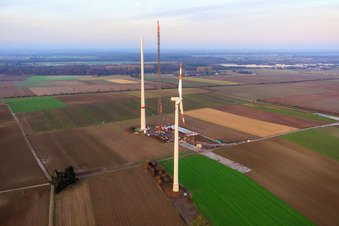 Giant crane for the repowering of the wind farm Minfeld. JUWI is replacing four old turbines (GE 1.5) from 2004 with two new, modern Vestas V162 turbines, each with six MW. in Minfeld in the state Rhineland-Palatinate, Germany from the plane