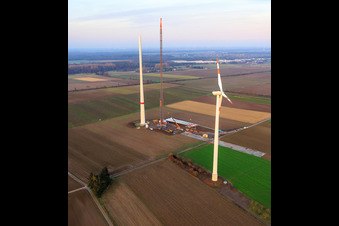 Bird's eye view of Giant crane for the repowering of the wind farm Minfeld. JUWI is replacing four old turbines (GE 1.5) from 2004 with two new, modern Vestas V162 turbines, each with six MW. in Minfeld in the state Rhineland-Palatinate, Germany