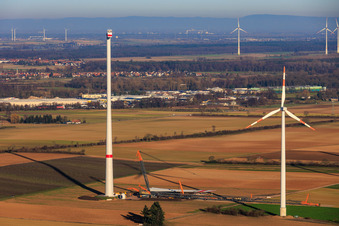 Giant crane for the repowering of the wind farm Minfeld. JUWI is replacing four old turbines (GE 1.5) from 2004 with two new, modern Vestas V162 turbines, each with six MW. in Minfeld in the state Rhineland-Palatinate, Germany viewn from the air