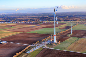 Oblique view of Repowering of the Minfeld wind farm. JUWI is replacing four older turbines (GE 1.5) from 2004 with two new, modern Vestas V162 turbines, each with a capacity of six MW. in Kandel in the state Rhineland-Palatinate, Germany