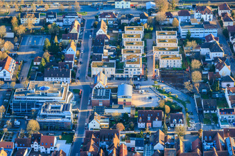 Oblique view of Construction pit for the expansion of the residential complex in the city center in Kandel in the state Rhineland-Palatinate, Germany