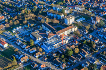Construction site for the expansion of the Asklepios Südpfalzklinik Kandel in Kandel in the state Rhineland-Palatinate, Germany viewn from the air