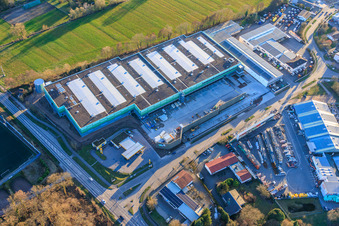 Almost completed new building of the logistics park by HANSAINVEST and DFI-Real-Estate Kandel for FRISCHEPLATTFORM SÜDWEST of Gemüsering Stuttgart GmbH in the district Minderslachen in Kandel in the state Rhineland-Palatinate, Germany from the plane