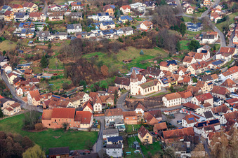Village view from the west with Wasgau shop and St. Peter and Paul Church in Bundenthal in the state Rhineland-Palatinate, Germany