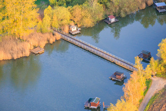Bridge over the eastern end of Lake Etang du Welschhof in Puttelange-aux-Lacs in the state Moselle, France