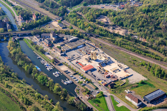 Boat landing stage on the Saar Coal Canal / Canal des houillères de la Sarre with BigMat hardware store ANGERMULLER in Saargemünd in the state Moselle, France