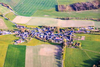 Village view from the north with round village pond and St. Mauritius Church. in the district Burglemnitz in Remptendorf in the state Thuringia, Germany