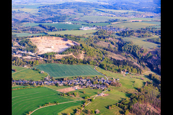 Village view from the northwest in front of the quarry of Granitwerk Fischer GmbH & Co. KG in the district Weitisberga in Wurzbach in the state Thuringia, Germany