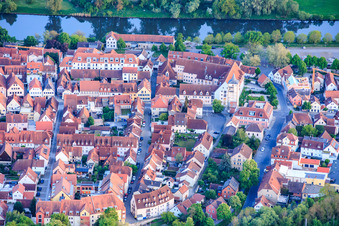 Historic old town on the banks of the Main River with promenade from the north in Haßfurt in the state Bavaria, Germany