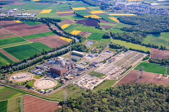 Decommissioned nuclear power plant Grafenrheinfeld of Preussenelektra GmbH on the banks of the Main River with Castor storage in the "gymnasium" and large substation in Grafenrheinfeld in the state Bavaria, Germany